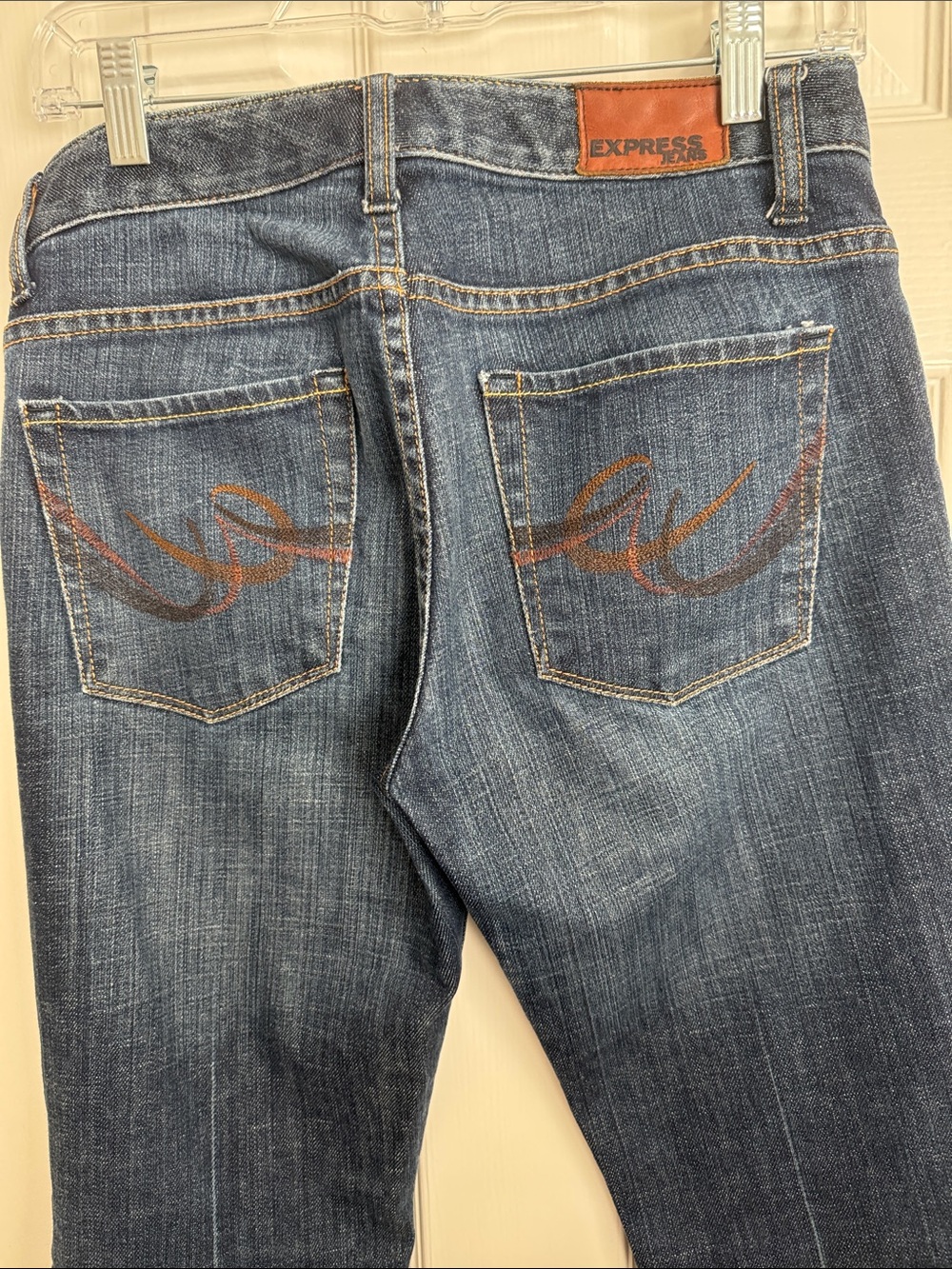 Express Women’s Blue Denim Bootcut Jeans with Back Pocket Embroidery